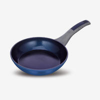 Blue nonstick forged aluminum fry pan with soft touch bakelite handle
