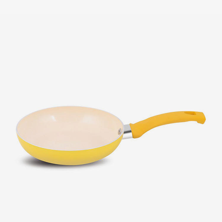 Yellow nonstick press aluminum fry pan with soft touch bakelite handle